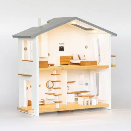 Two storey wooden dollhouse with working lights and furniture