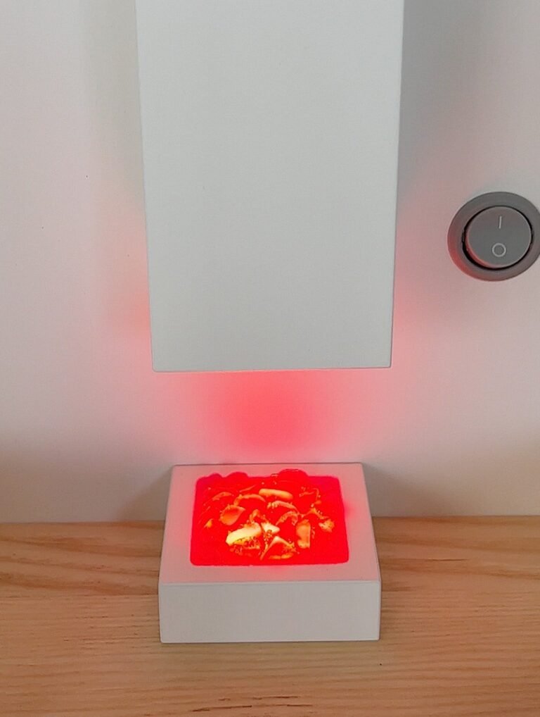 Katin Domik dollhouse fireplace with red flame light effect and child-friendly wall switch in Scandinavian style