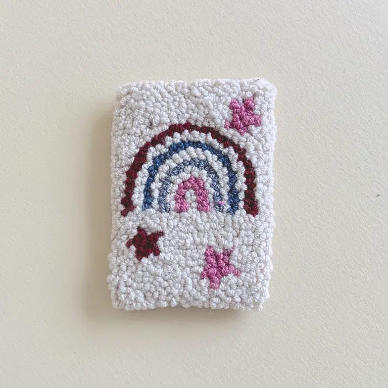 Rug with rainbow