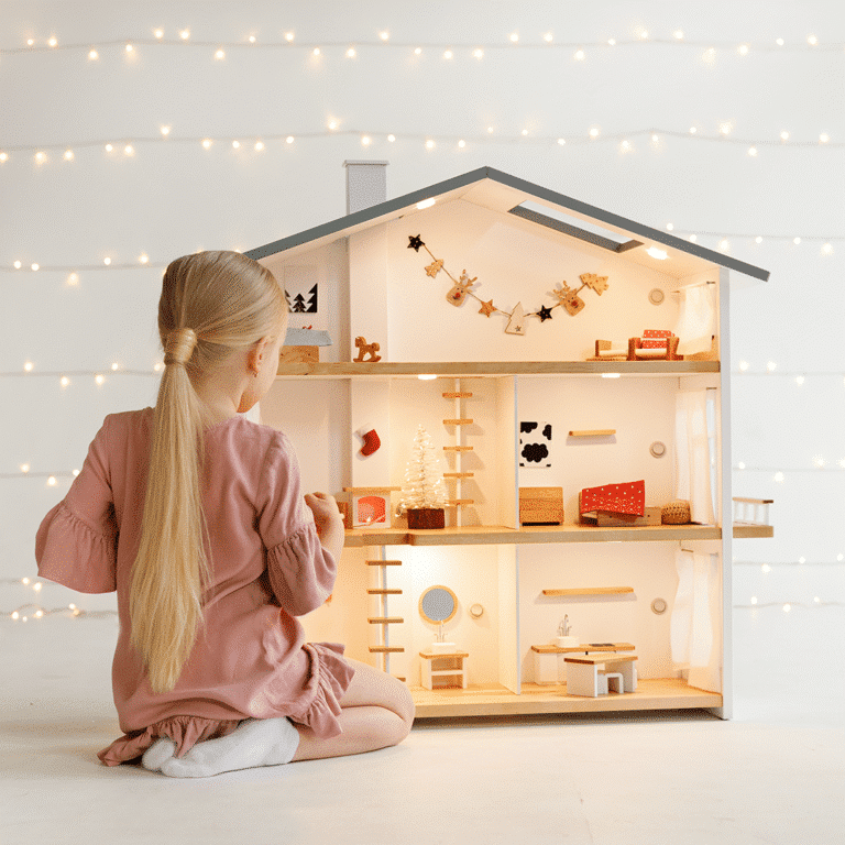 A complete Katin Domik modern wooden dollhouse with integrated warm lighting and furniture.