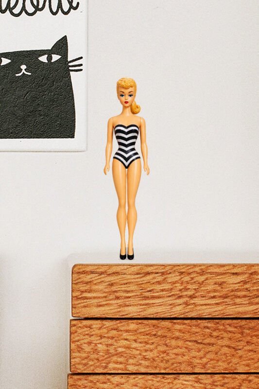 World's Smallest Barbie doll inside a 1:12 scale dollhouse